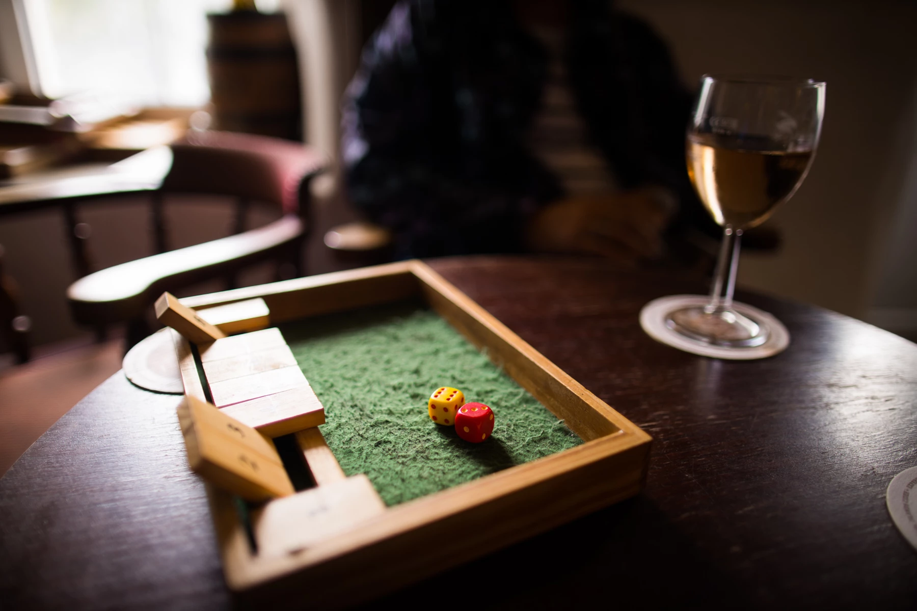 Colour photo of a wooden board game on a table