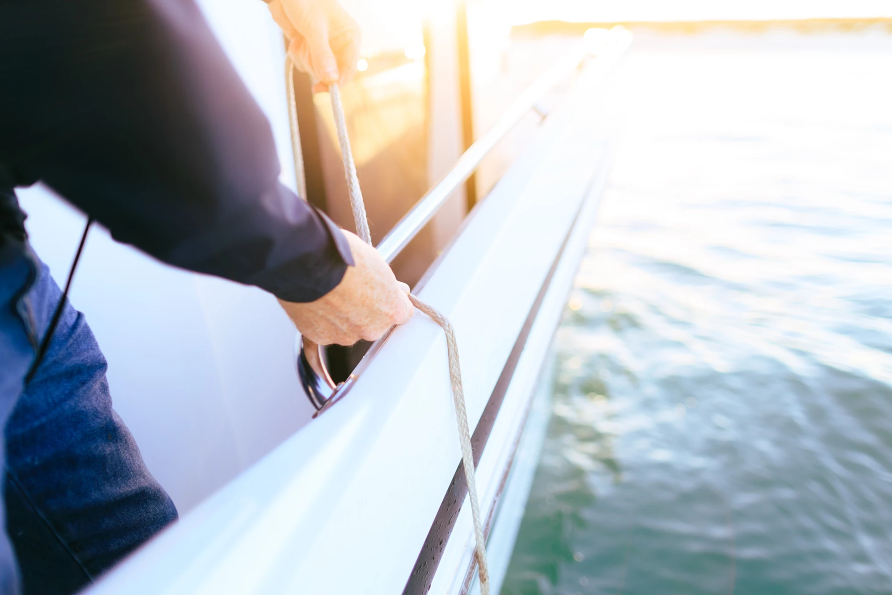 Colour photo of a person holding a fishing rod