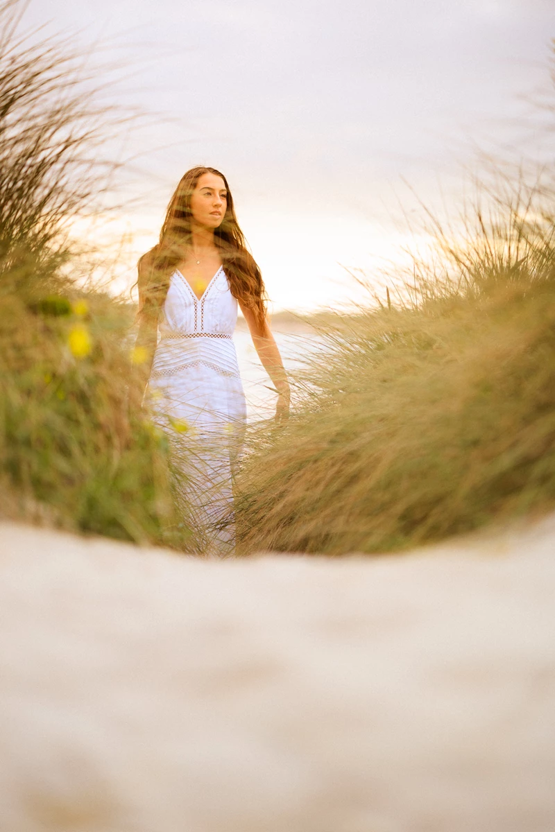Colour photo of a person in a dress