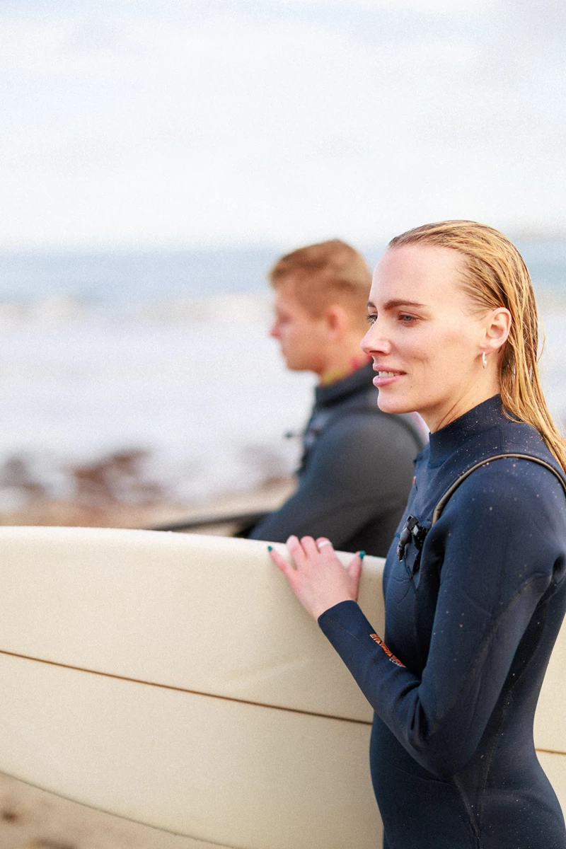 Colour photo of a woman and a man on a boat