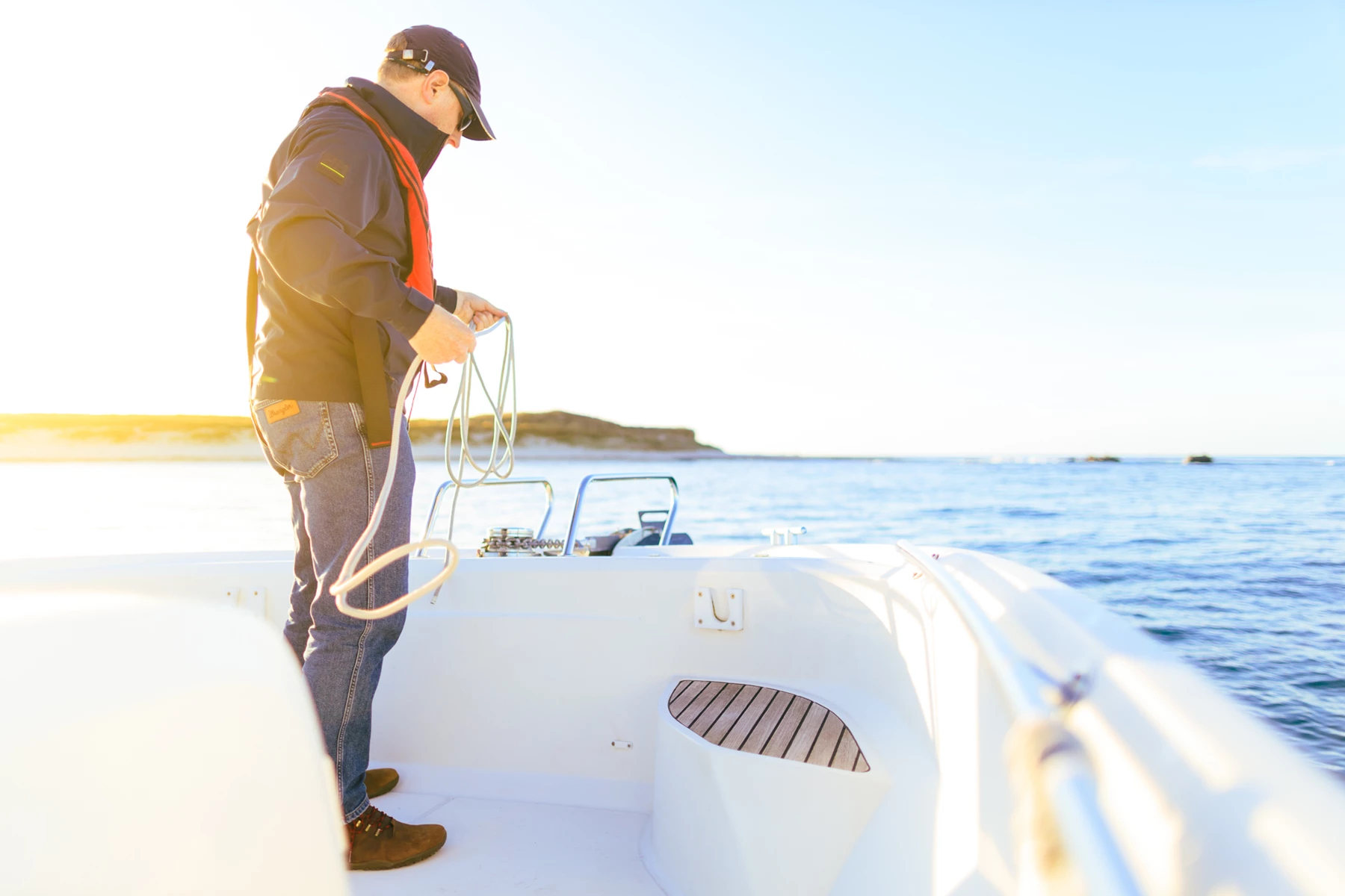 Colour photo of a man on a boat