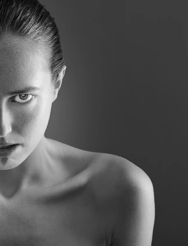 Studio portrait of woman looking menacing