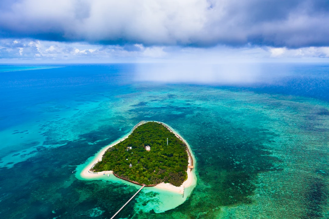 Colour photo of an island in the ocean