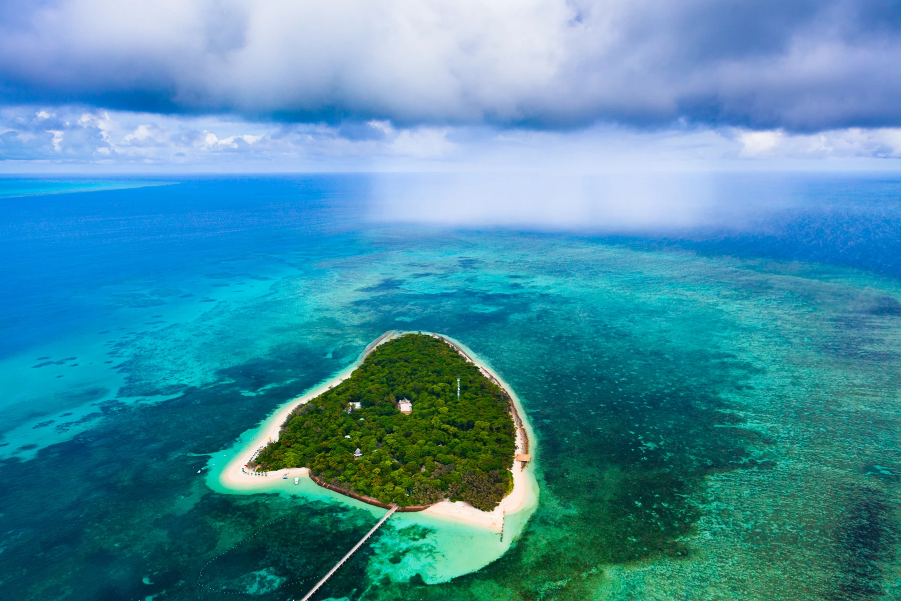 Colour photo of an island in the ocean