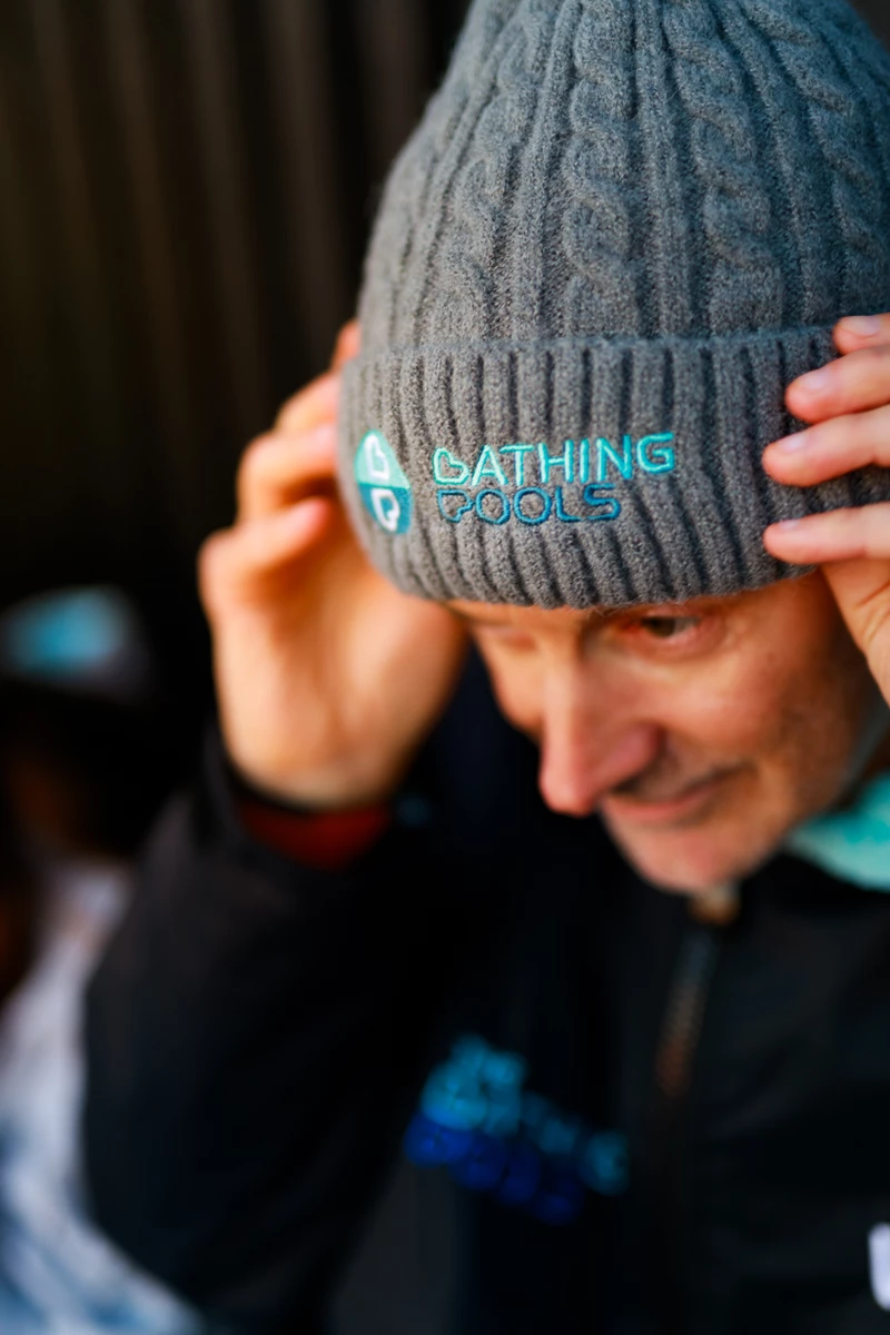 Colour photo of a person wearing a hat