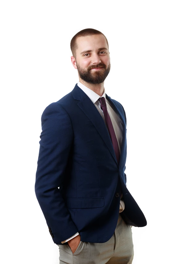 Colour photo of a man in a suit