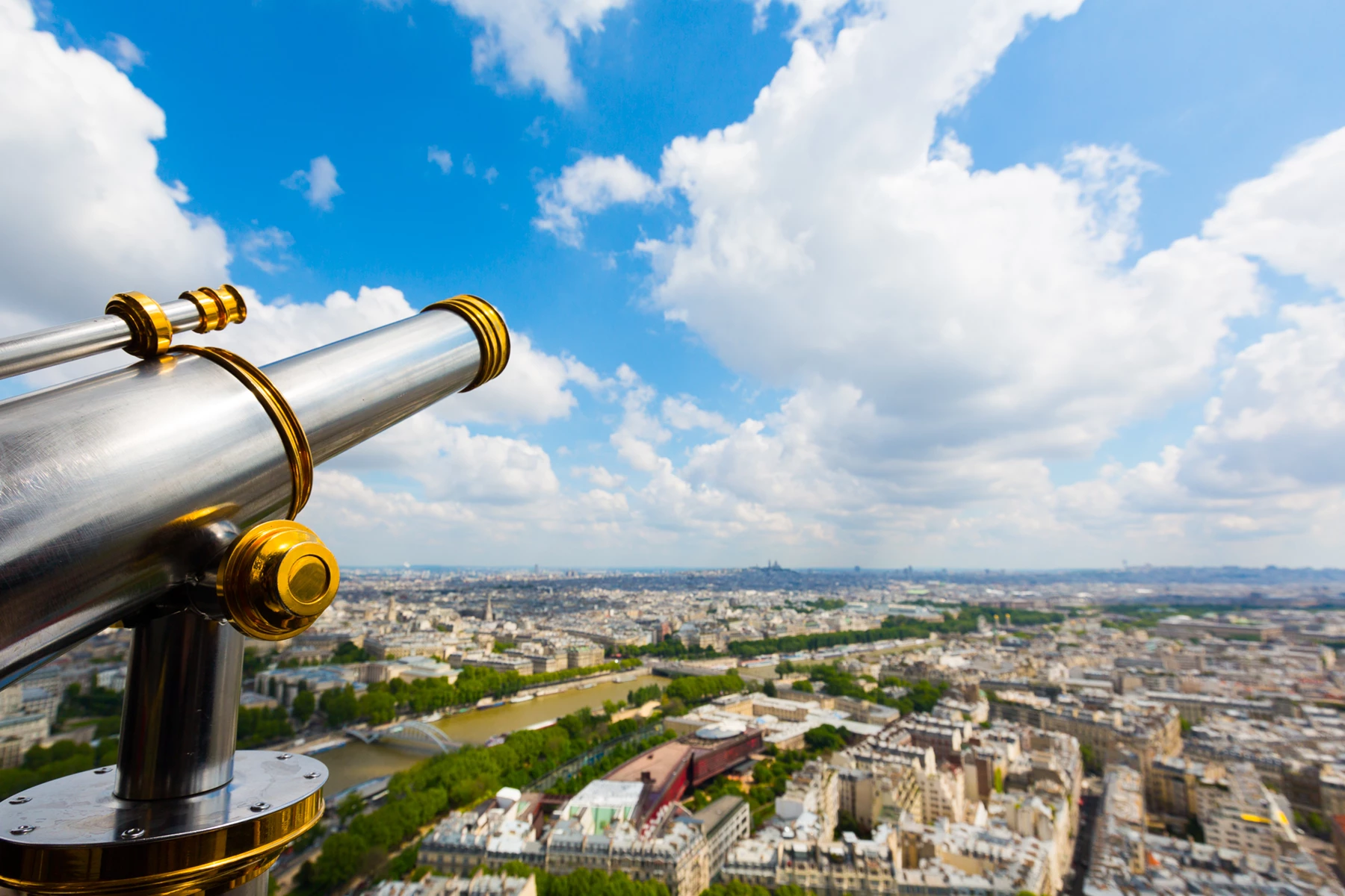Colour photo of a view of a city from a telescope