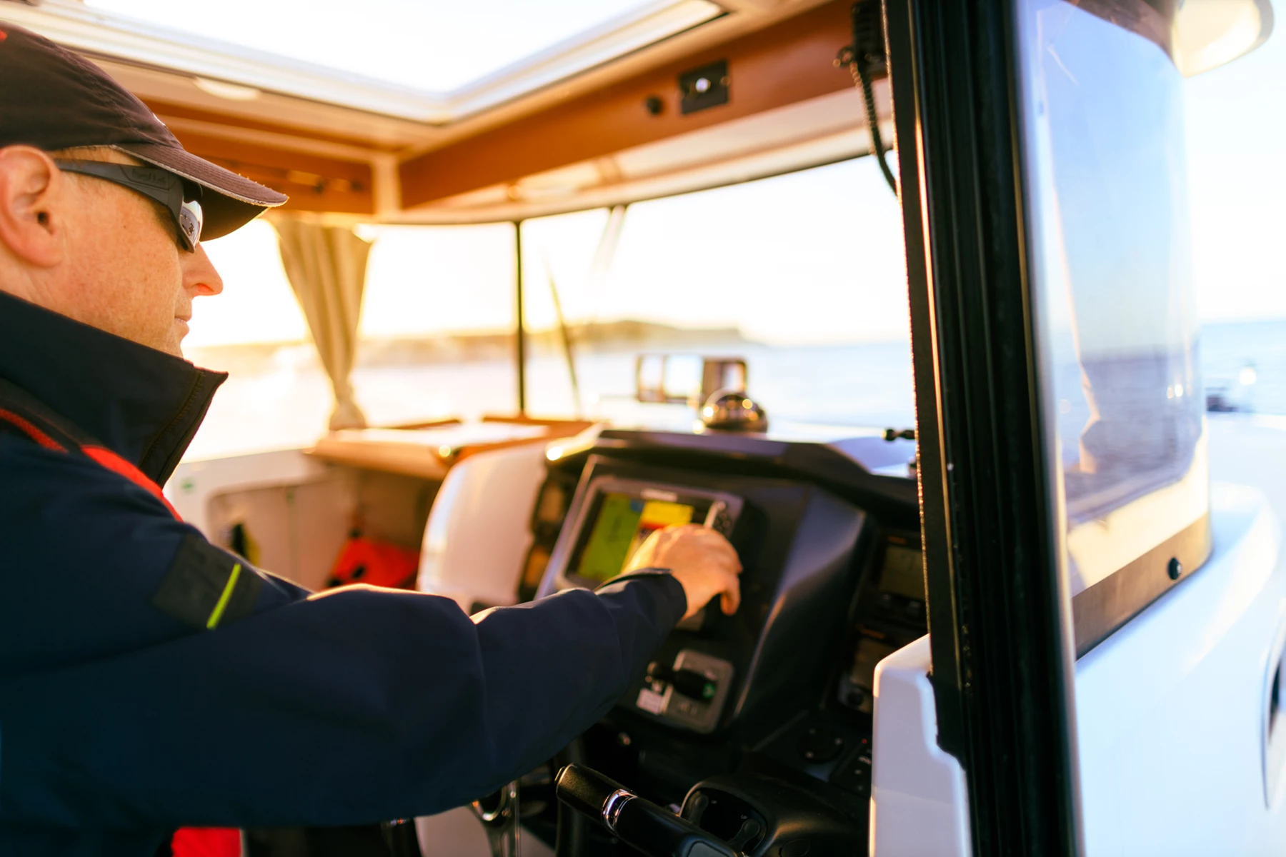 Colour photo of a man operating a machine