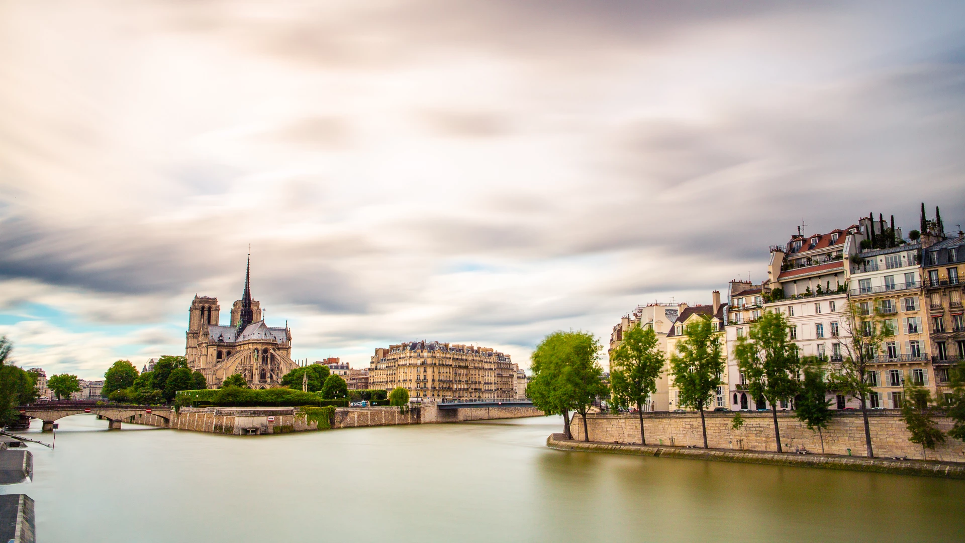 Colour photo of a body of water with buildings along it
