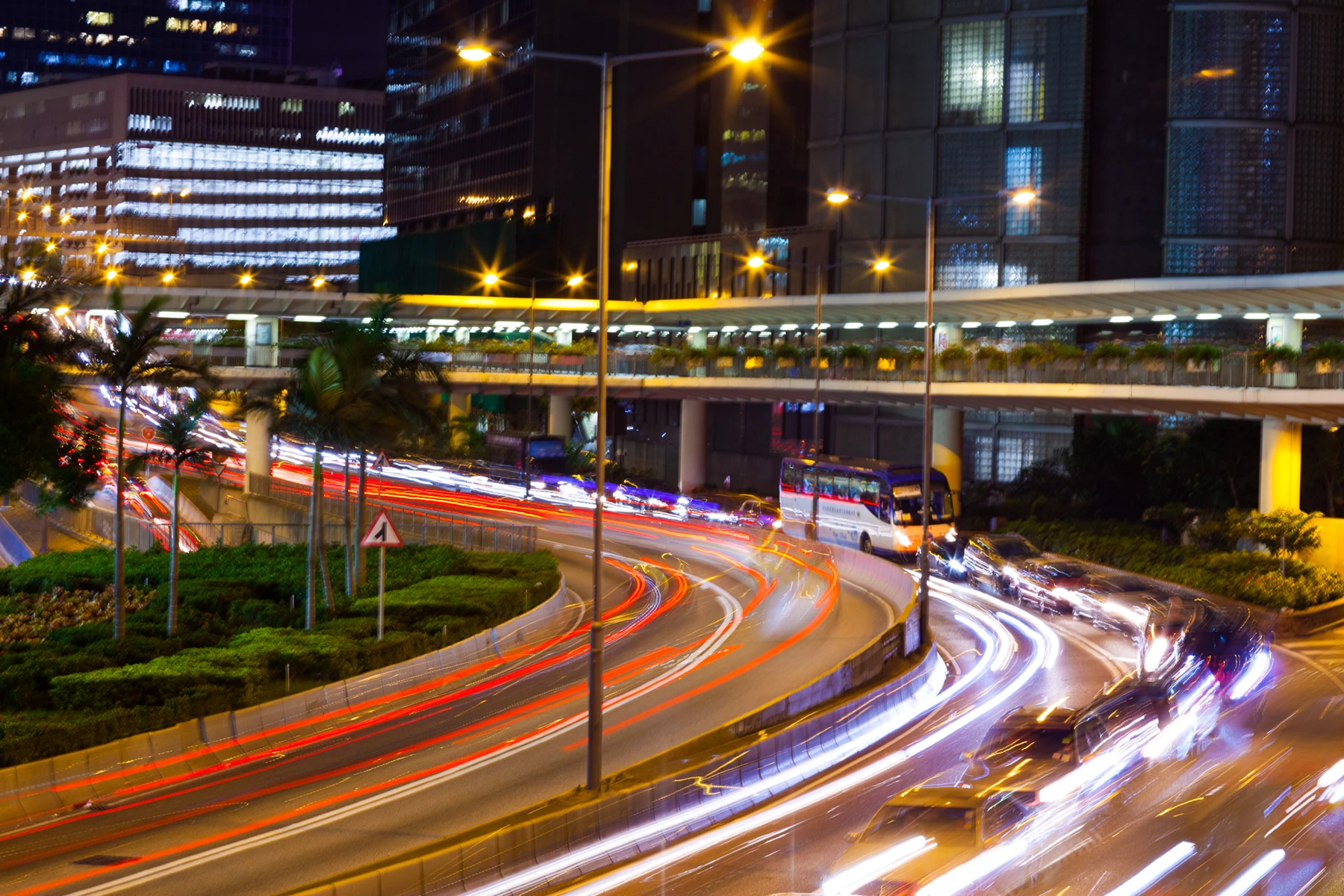 Colour photo of a city street at night