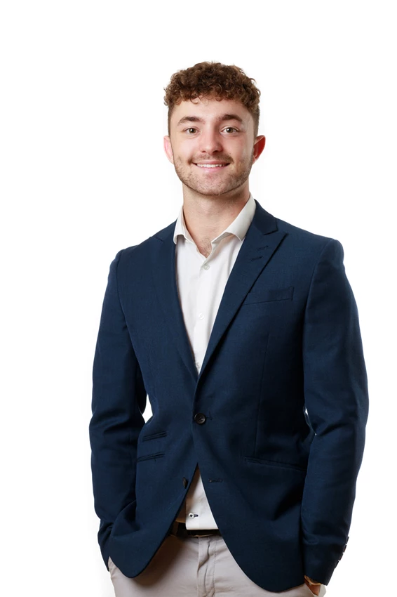 Colour photo of a man in a suit