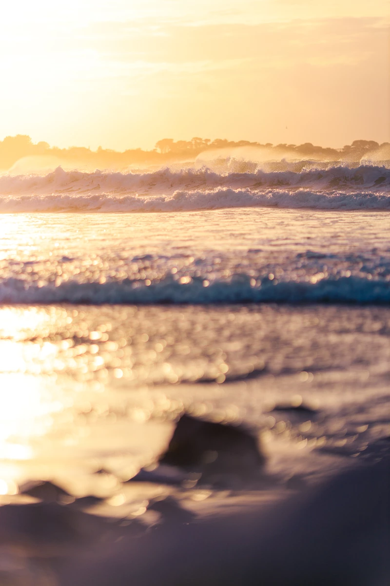 Colour photo of a body of water with clouds above
