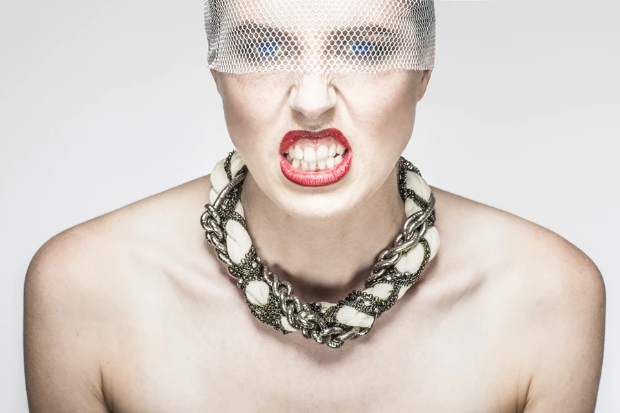Studio beauty photo of snarling woman