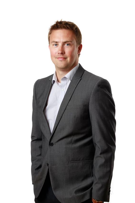 Colour photo of a man in a suit