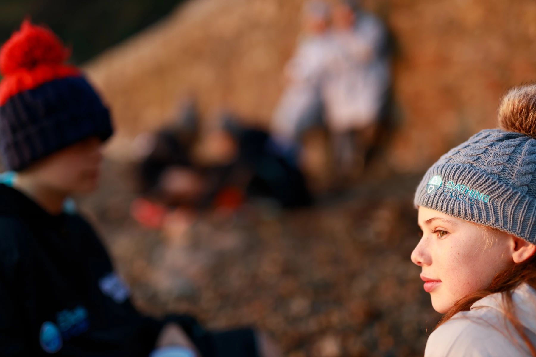 Colour photo of a person wearing a hat